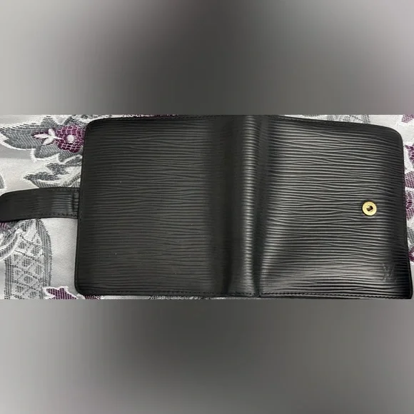 A very Loved Louis Vuitton bifold wallet